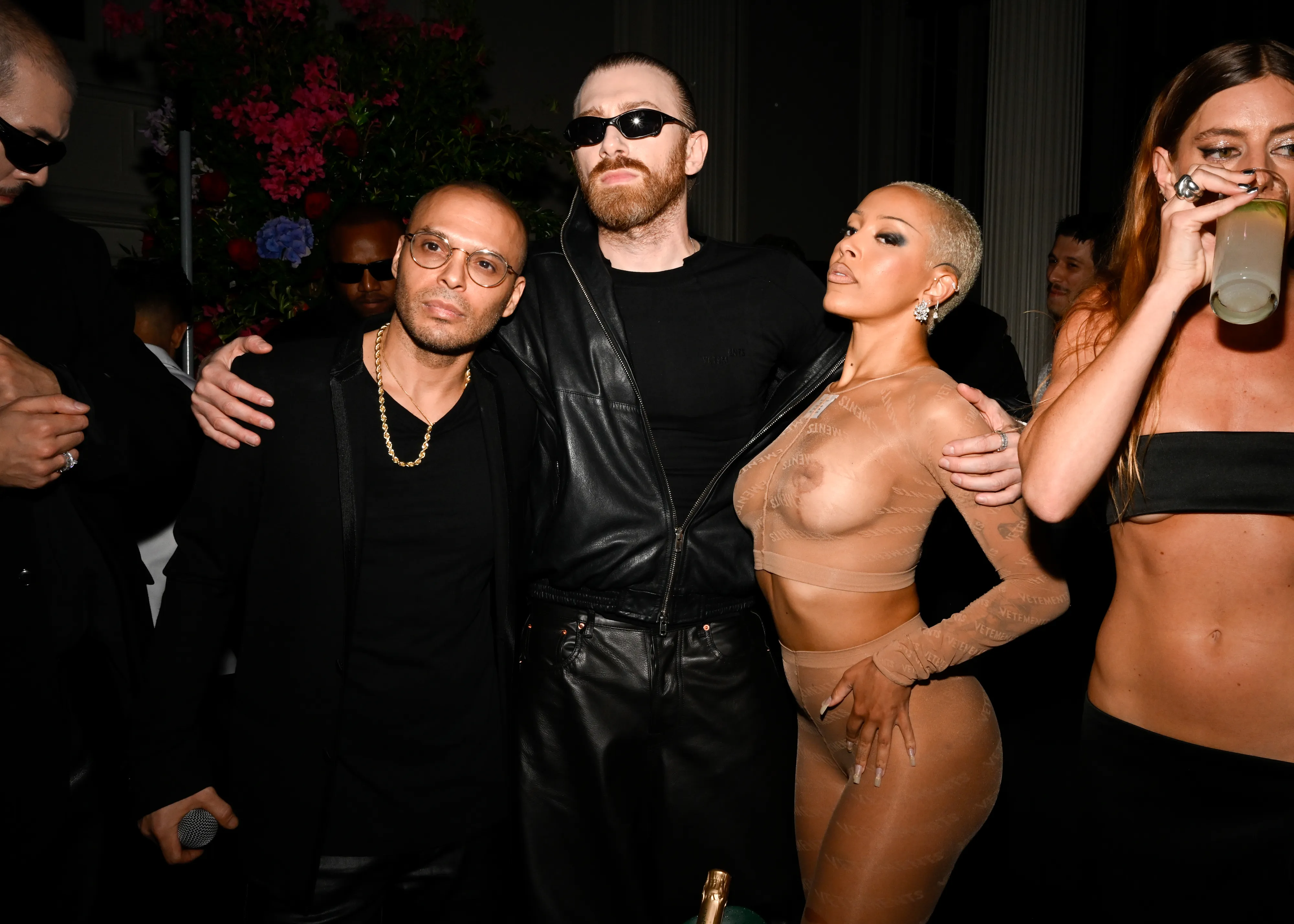 Akiva with Guram Gvasalia and Doja Cat at his annual Met gala afterparty. 