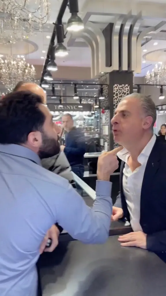 Two rival jewelers in NYC Diamond District brawl over fraud allegations.