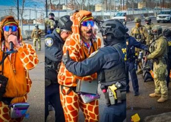 ‘Leave the giraffe alone!’ ICE violently arrests comedian mocking them in animal costume