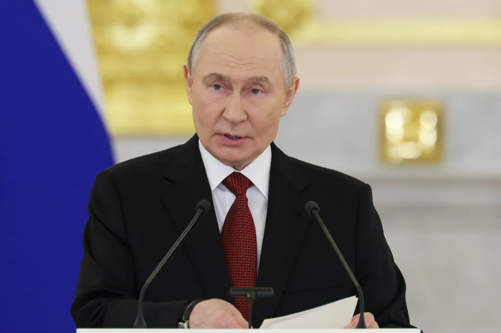 Russian President Vladimir Putin speaking at a podium.