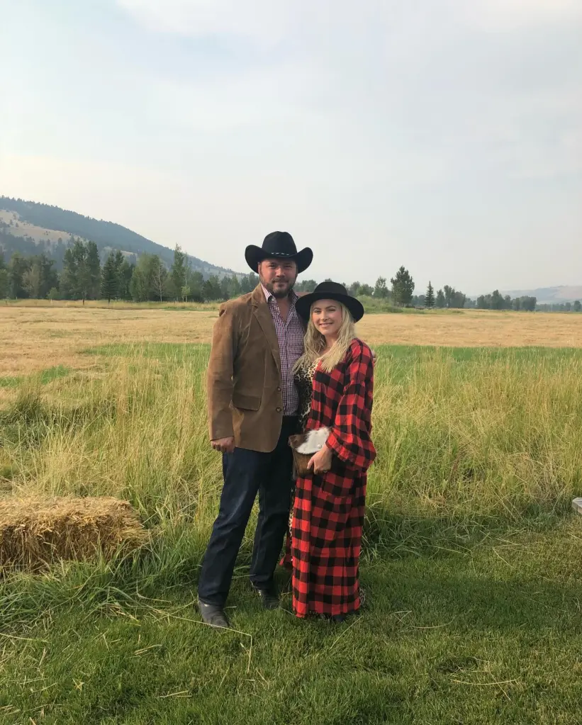 Meghan McCain and Ben Domenech stand in a grassy field in Wyoming.