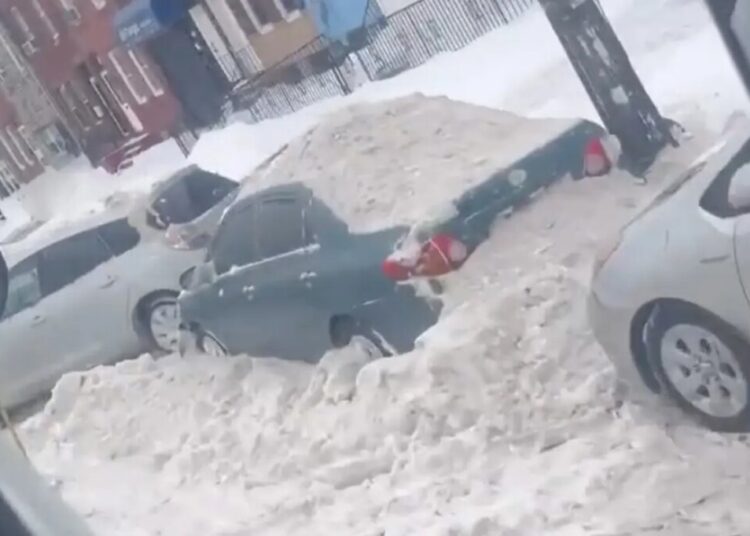 Laughing Philadelphia worker ‘intentionally’ plows snow onto parked cars after Winter Storm Fern in viral video: ‘Happy snow day, motherf–kers’