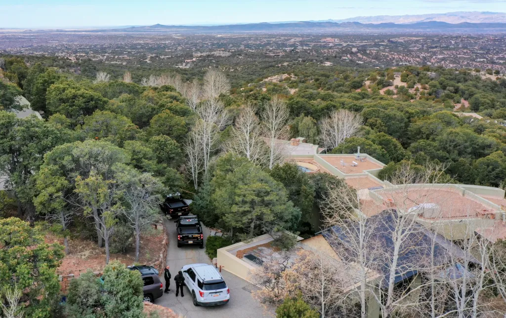 Santa Fe County deputies and vehicles at the home of actor Gene Hackman and Betsy Arakawa.