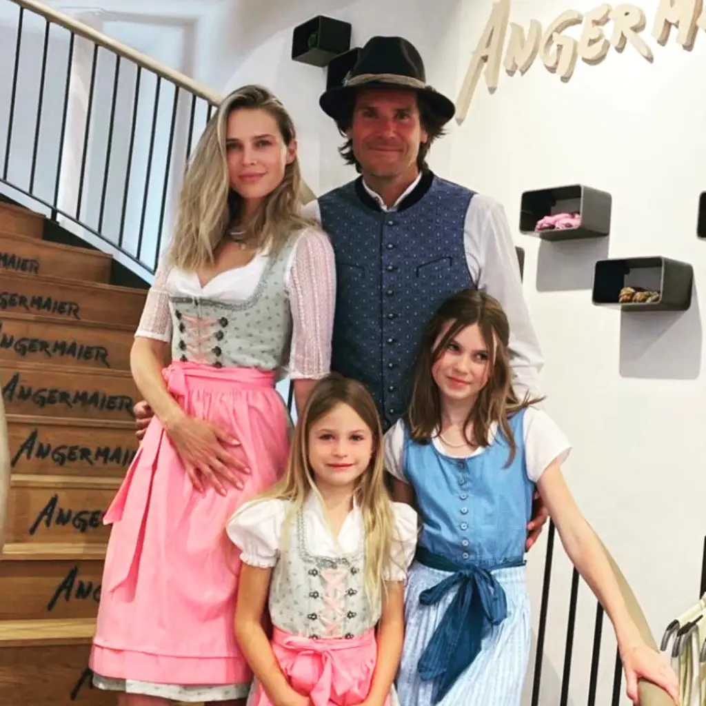 Sara Foster and Tommy Haas with their daughters wearing dirndls.