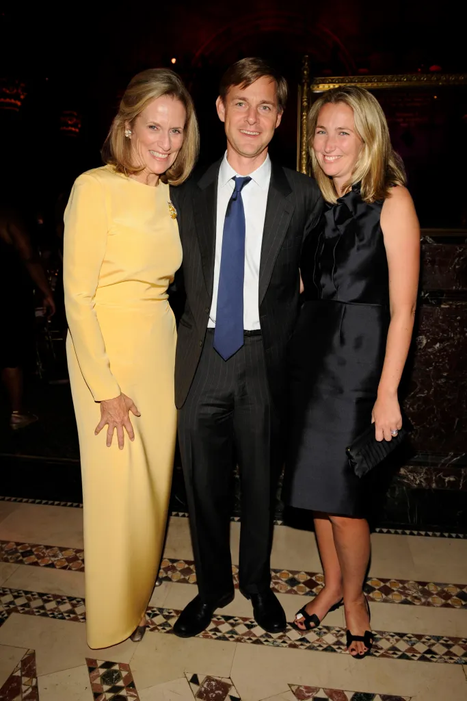 Susan Burden, Henry Davis, and Bell Davis posing for a photo.