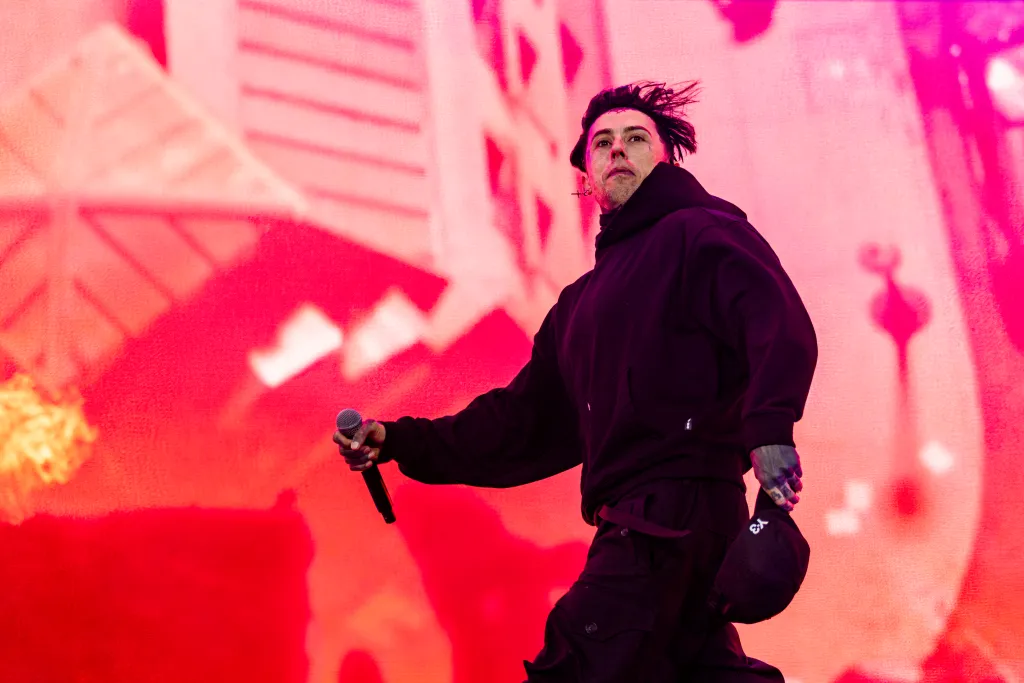 Singer Ronnie Radke performing live on stage.