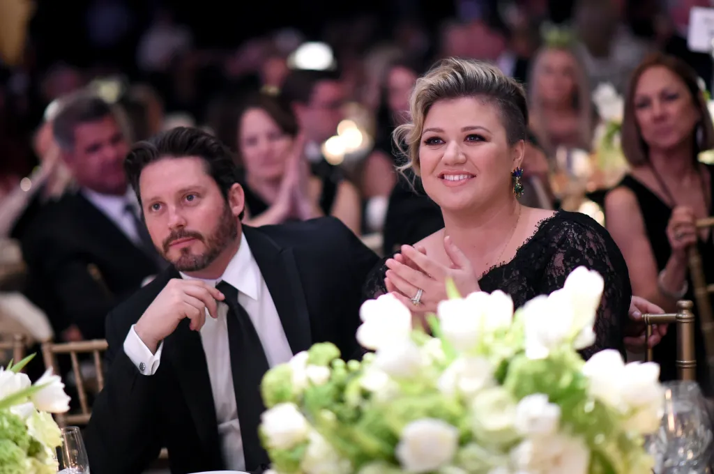 Brandon Blackstock (L) and singer/songwriter Kelly Clarkson attend Muhammad Ali's Celebrity Fight Night XXI at the JW Marriott Phoenix Desert Ridge Resort & Spa on March 28, 2015 in Phoenix, Arizona.