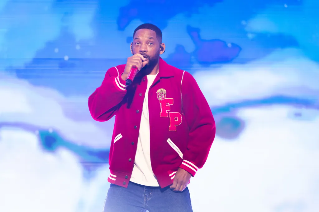 Will Smith performing live on stage.