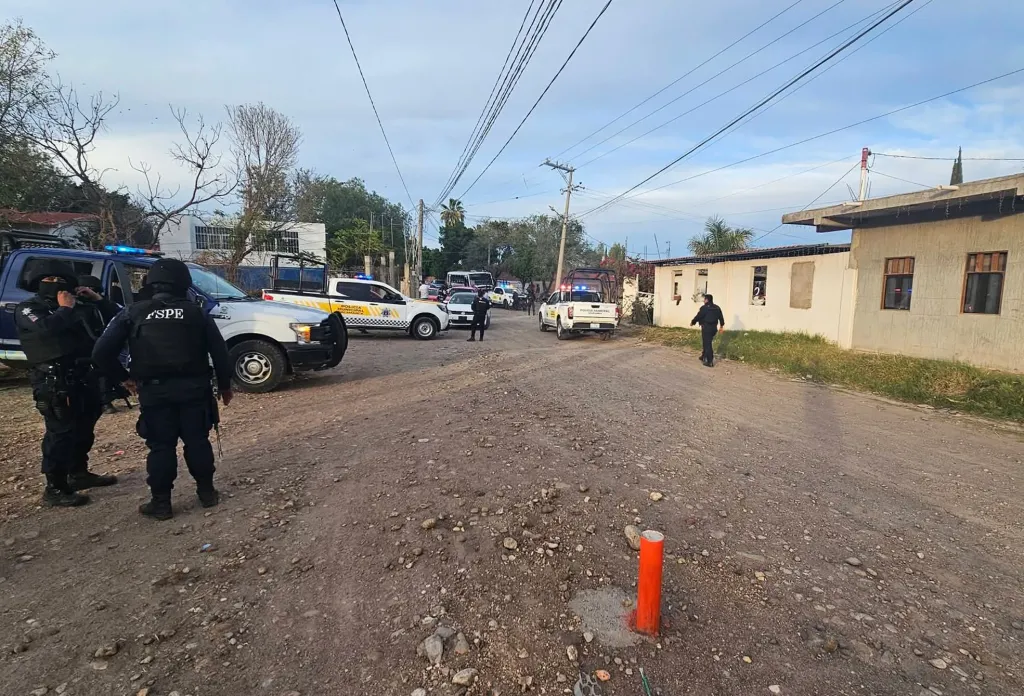 Security personnel patrol near the soccer field where a shooting occurred in Salamanca, Mexico.