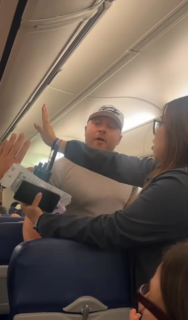 Man in hat yelling on plane.