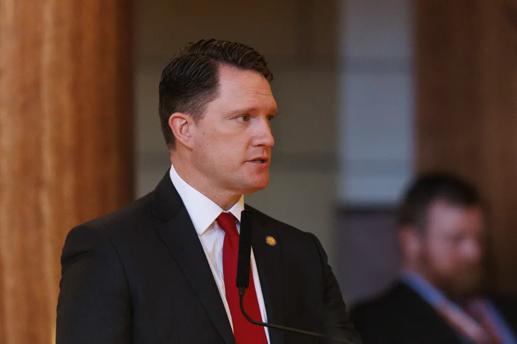 Nebraska State Senator Ben Hansen speaking at the State Capitol.