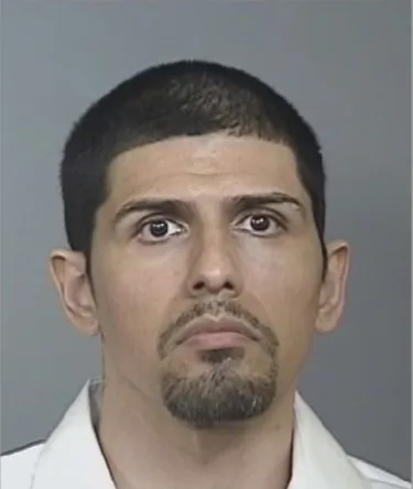Mugshot of suspect Nicholas Palomo.