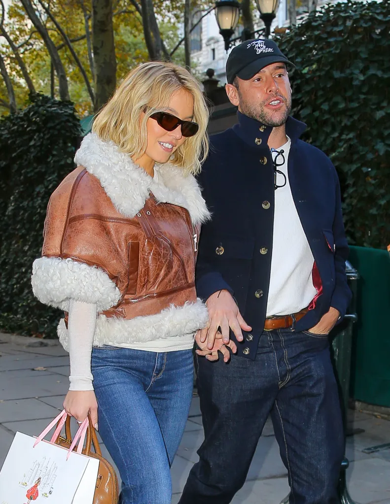 Sydney Sweeney and Scooter Braun hold hands in NYC.