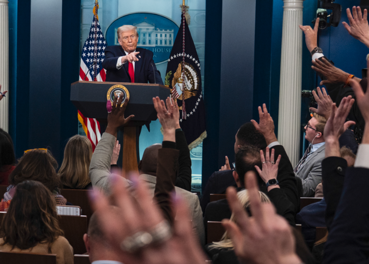 In surprise appearance, Trump discusses Somalia, Columbus Day, binder clips