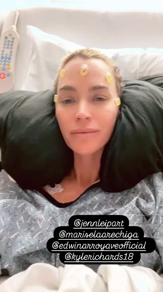 Teddi Mellencamp in a hospital bed with medical sensors on her forehead.