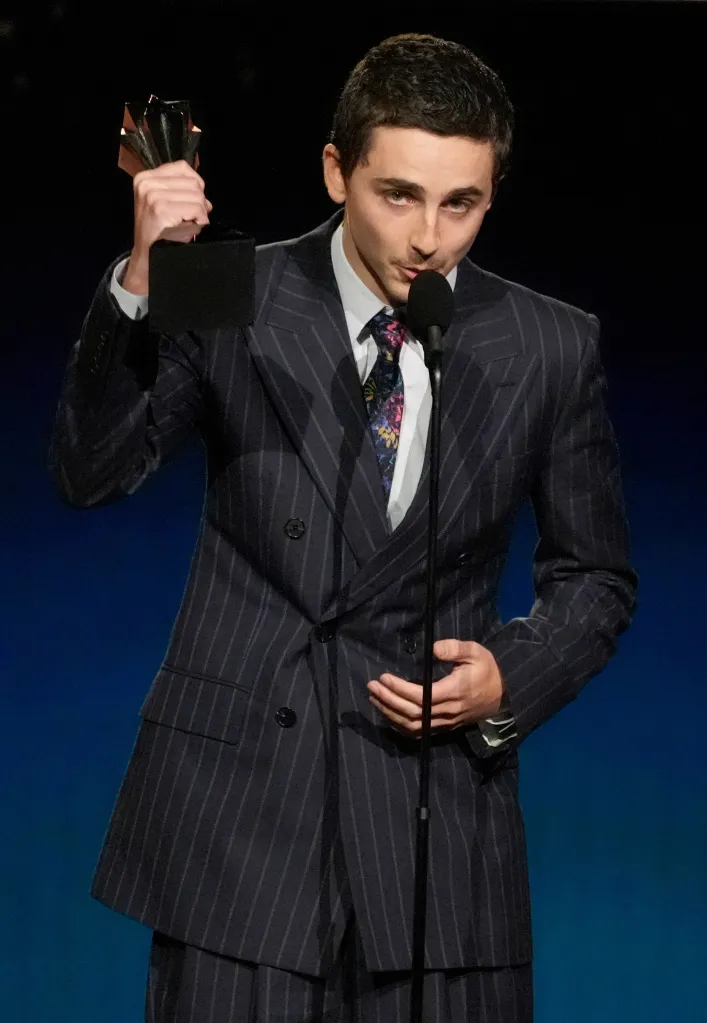 Timothée Chalamet accepting the award for best actor.