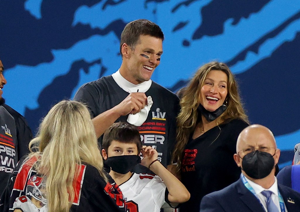 Tom Brady celebrates with Gisele Bundchen after winning Super Bowl LV.