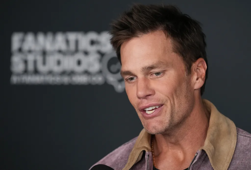 Close-up of Tom Brady speaking, with the 