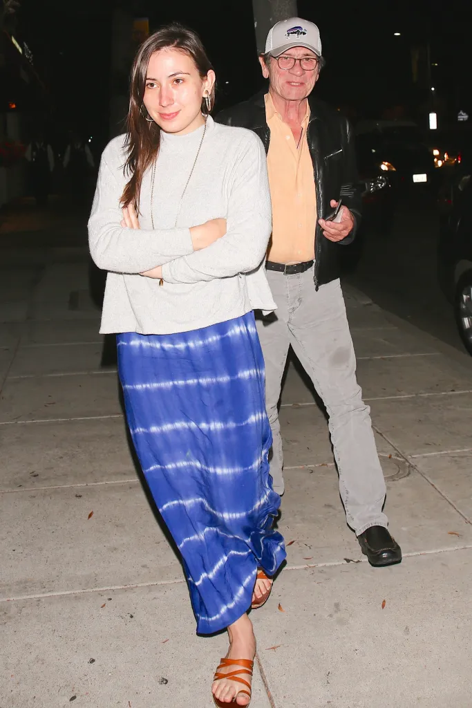 Tommy Lee Jones and daughter Victoria smiling after sushi dinner.