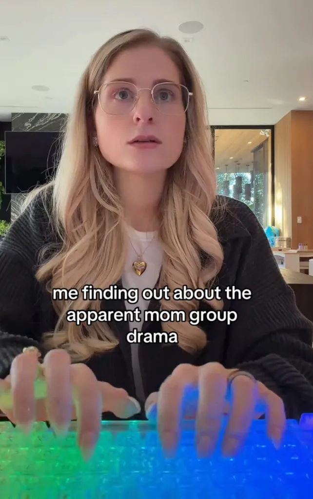 Meghan Trainor reacting to mom group drama while typing on a colorful keyboard.