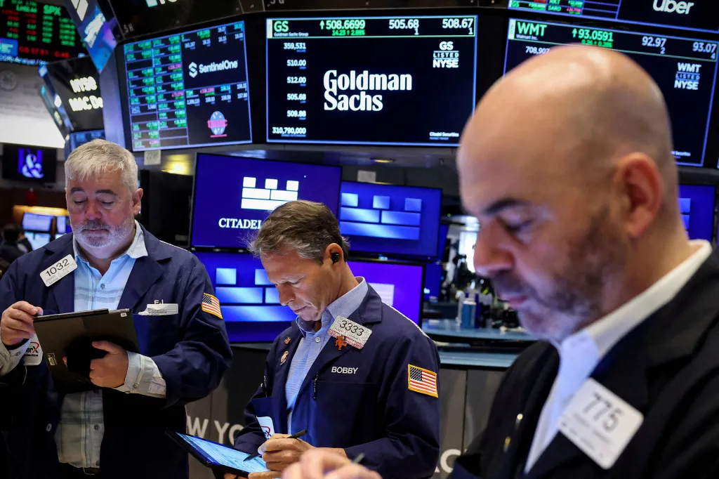 Traders work on the floor of the New York Stock Exchange.