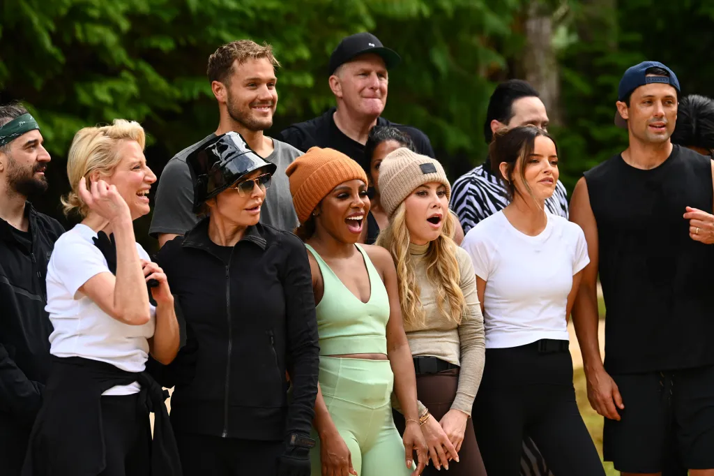 Reality show contestants Mark Ballas, Dorinda Medley, Lisa Rinna, Colton Underwood, Candiace Dillard Bassett, Michael Rapaport, Tara Lipinski, Maura Higgins, and Stephen Colletti outdoors.