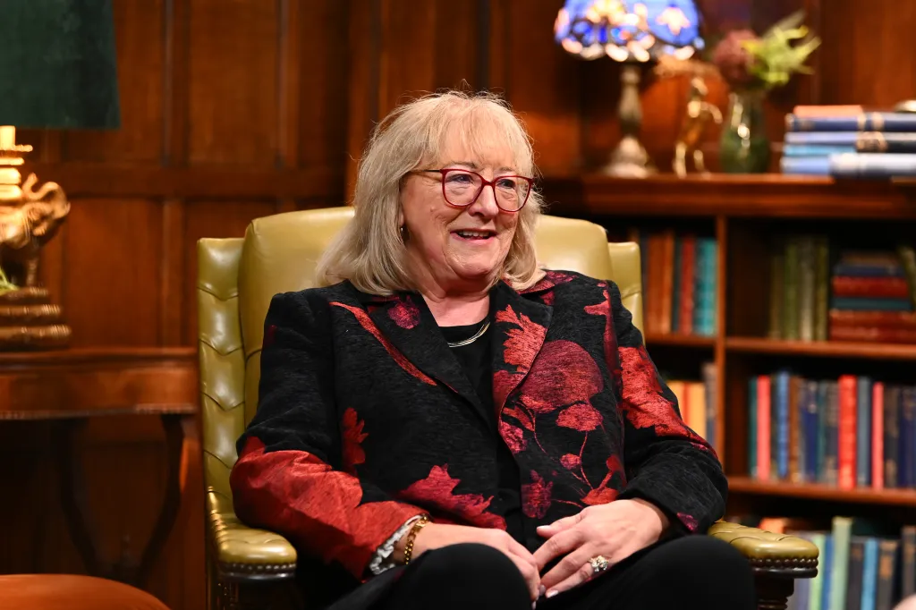 Donna Kelce seated in a chair from 