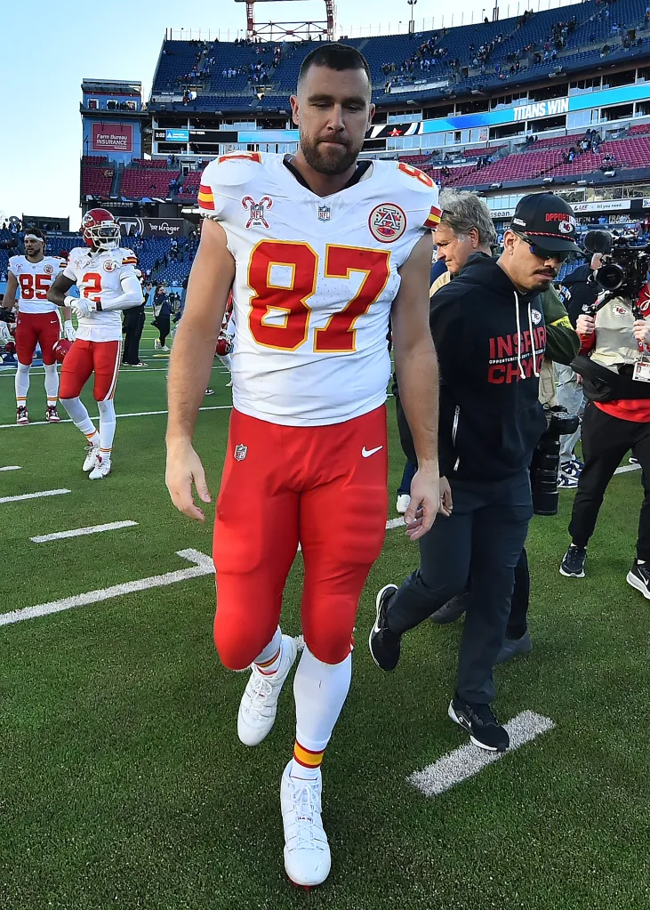 Travis Kelce of the Kansas City Chiefs walks off the field after being defeated by the Tennessee Titans.