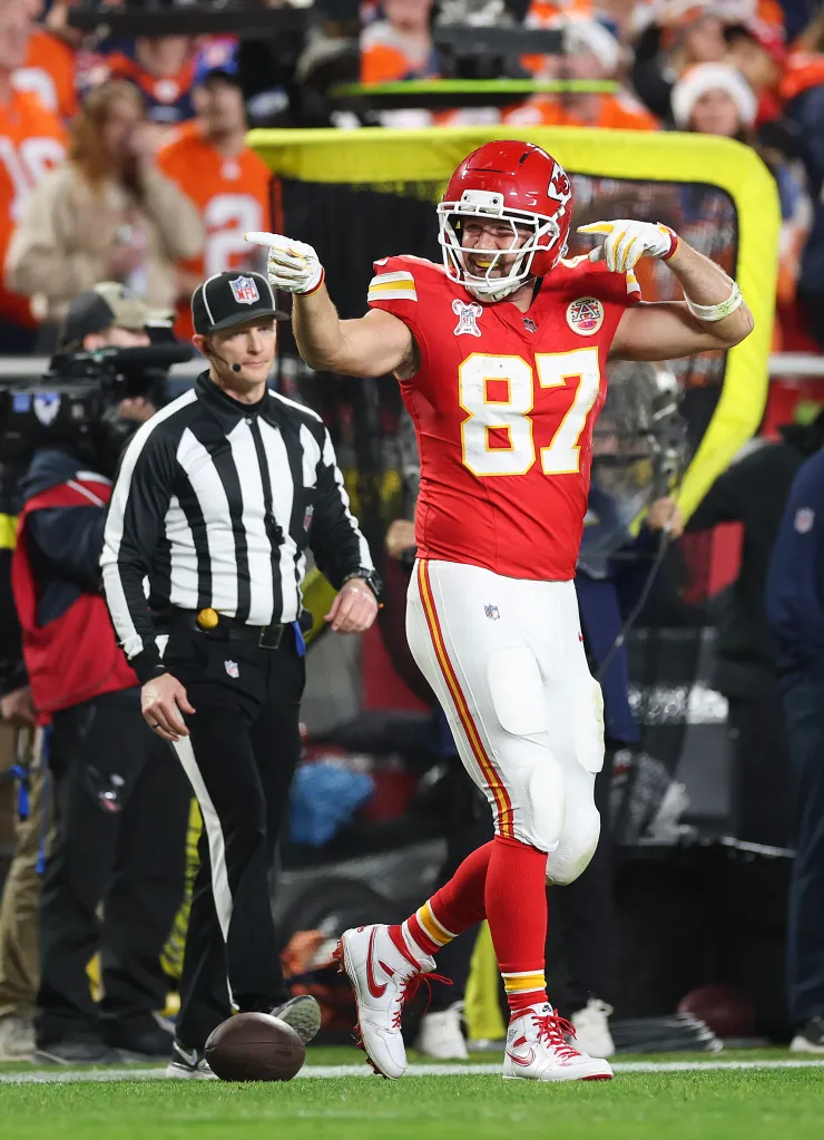 Travis Kelce celebrating a first down for the Kansas City Chiefs against the Denver Broncos.