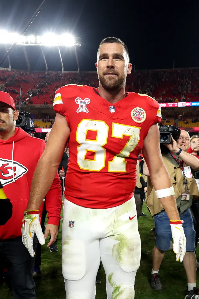 Travis Kelce #87 of the Kansas City Chiefs leaving the field after a loss.