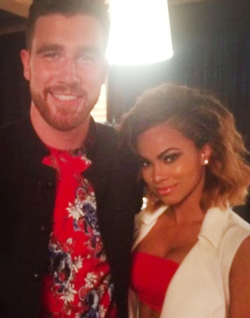 Travis Kelce smiling next to his ex-girlfriend Maya Benberry.