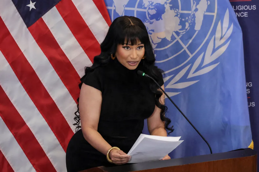 Nicki Minaj speaking at a panel discussion on combating religious violence.