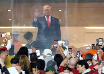 Trump cheered by CFP national championship game crowd during national anthem at Indiana-Miami clash