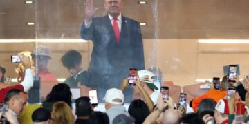 Trump cheered by CFP national championship game crowd during national anthem at Indiana-Miami clash