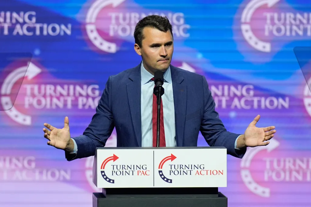 Charlie Kirk speaking at a Turning Point USA rally.
