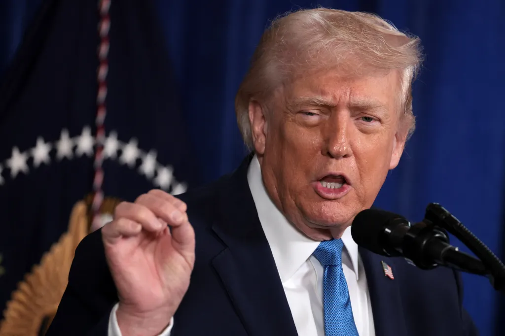 President Donald Trump speaking at a press conference following a US military strike on Venezuela.