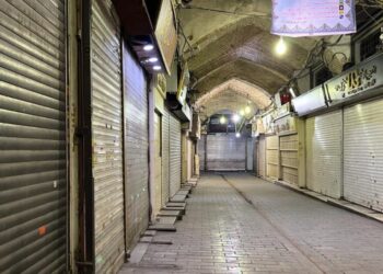 Security forces clash with protesters in Iran’s main market as at least 35 killed in demonstrations