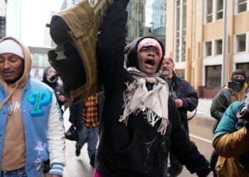 Counterprotesters chase off conservative influencer amid Minneapolis immigration crackdown