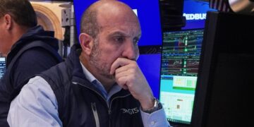 Most of Wall Street drifts as defense companies rally