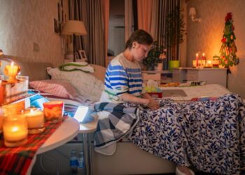 Freezing and in the dark, Kyiv residents are stranded in tower blocks as Russia targets power system