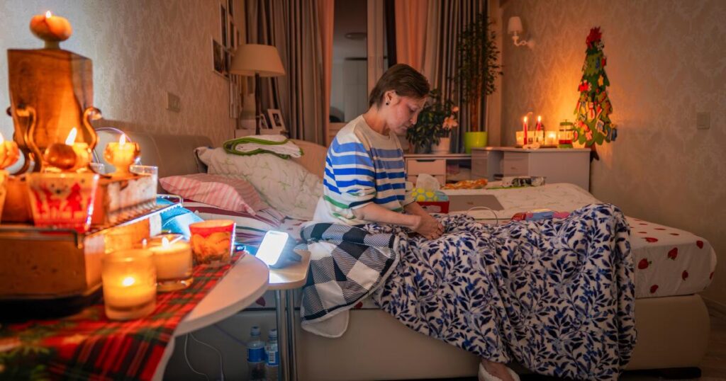 Freezing and in the dark, Kyiv residents are stranded in tower blocks as Russia targets power system