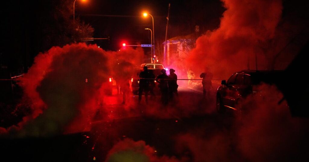 Tear gas floods a Minneapolis family’s SUV after they get caught between protesters and officers