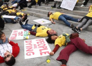 Dozens ‘die’ at L.A. City Hall to protest 290 traffic-related deaths in the city in 2025