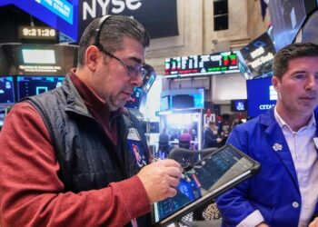 Stocks rise as gold hits another record and the dollar’s value sinks again