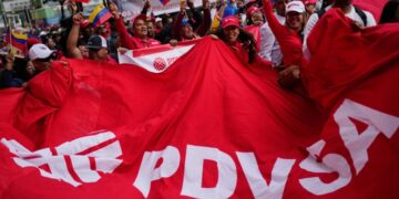 Venezuelan lawmakers vote to ease state grip on oil, abandoning a key socialist tenet