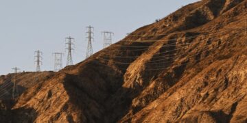 Wildfire victims decry state law protecting utilities from cost of disasters they cause