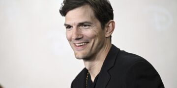 No sweat: Ashton Kutcher swears that he showers, despite past podcasts to the contrary