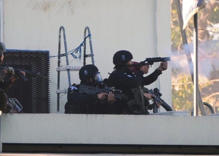 Guatemalan police free guards held hostage in prison; attacks kill 3 officers