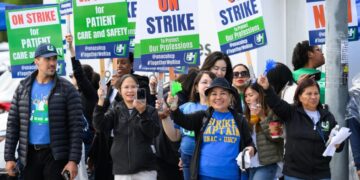 Tens of thousands of Kaiser Permanente healthcare workers launch open-ended strike
