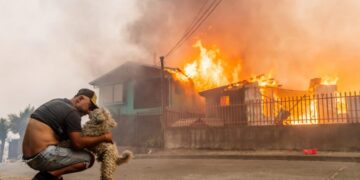 Wildfires race across Chile, leaving 18 dead and forcing 50,000 to flee